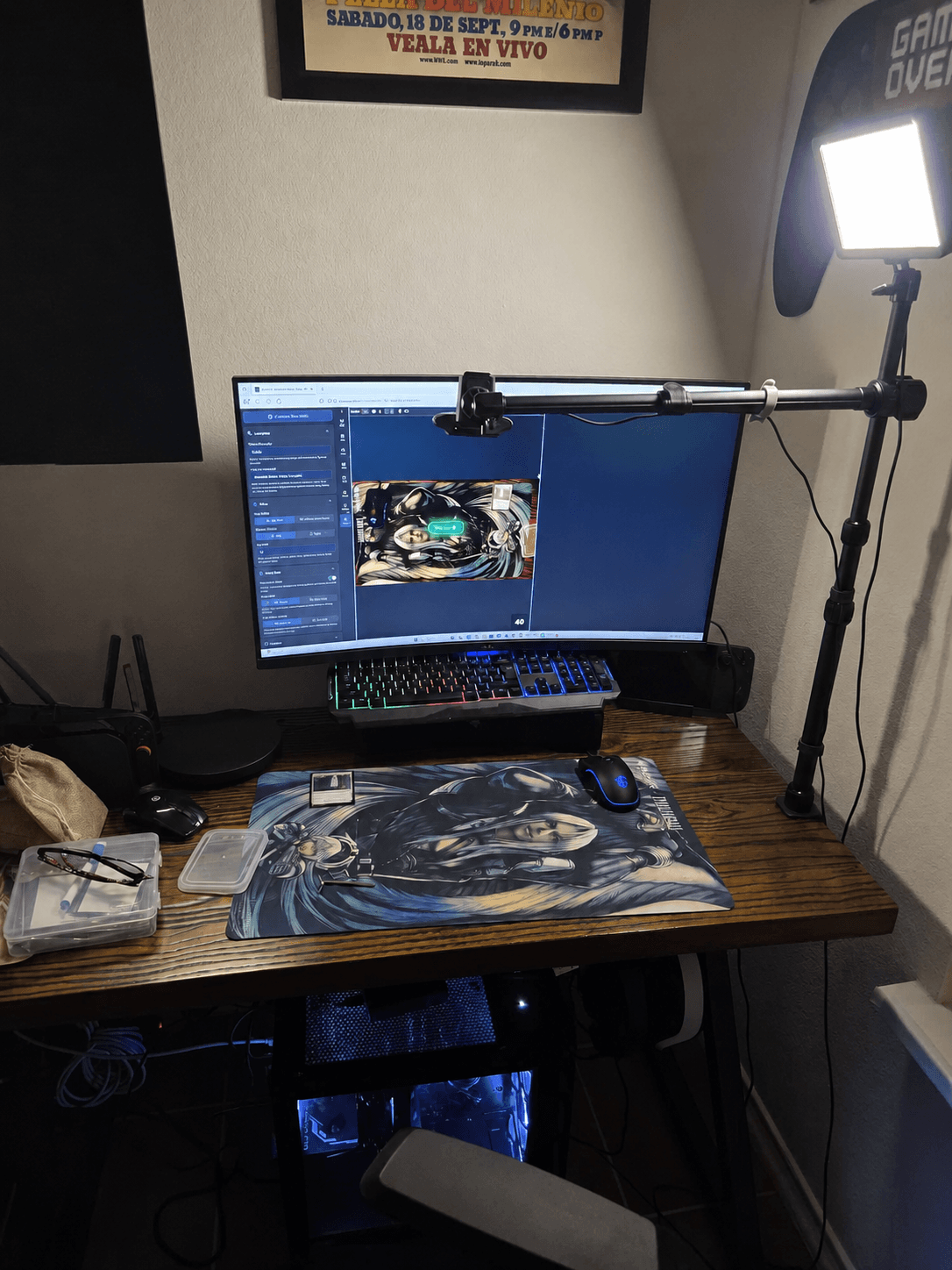 Desktop setup with an overhead camera aimed at a Magic playmat